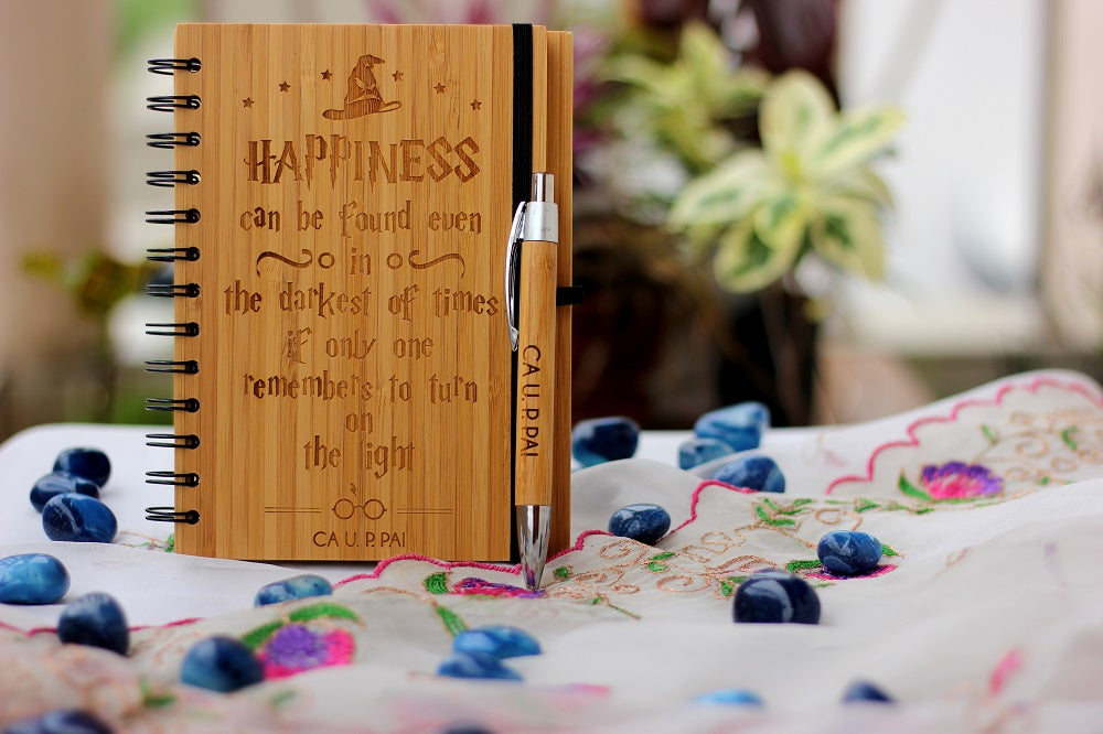 Happiness Can Be Found In The Darkest Of Times Wooden Journal. This Custom Wooden Writer's Diary Makes One Of The Best Personalized Harry Potter Gifts. Buy More Harry Potter Gift Items Online From The Woodgeek Store.