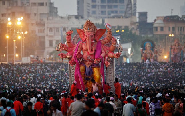 Lord Ganpati Immersion Accompanied By A Lot Of Singing And Dancing - Ganesh Chaturthi Is One Of The Bigeest Festivals In India - Looking For Gifts For Ganesh Chaturthi ? Buy The Best Vinayaka Chaturthi Gifs From The Woodgeek Store.