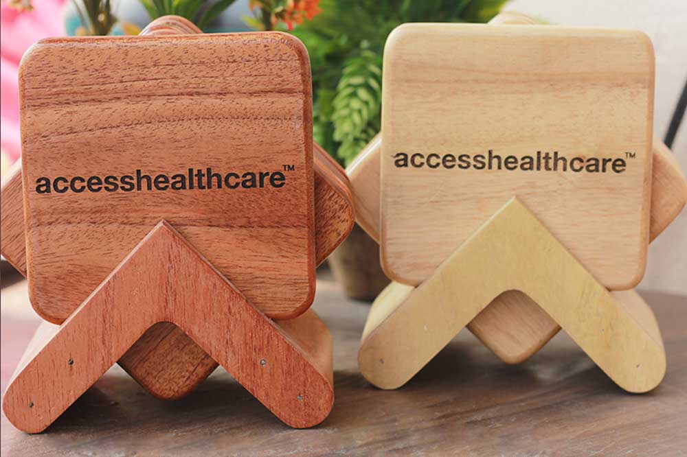 Wooden Coasters as Personalized Corporate Gifts for Access Healthcare. The Best Business Promotional Gifts for Clients. Get Wholesale Rates for Bulk Orders of Corporate Gifts at Woodgeek Store