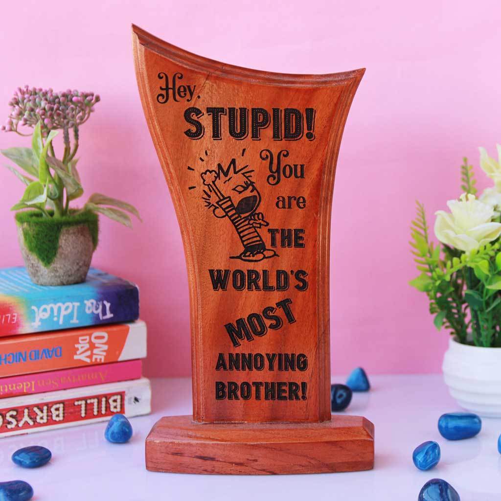 World's Most Annoying Brother Trophy And Award. This Wooden Award Standee Makes A Great Online Rakhi Gifts For Sister. Buy More Rakhi Special Gifts From The Woodgeek Store.