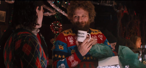 Seth Rogen wearing a Christmas sweater