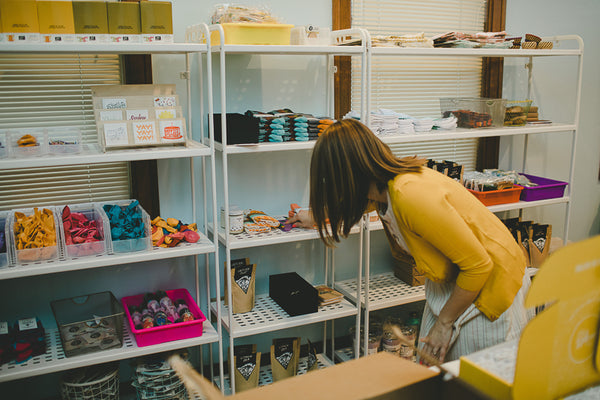 packing orders at The confetti Post