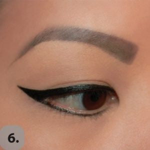Connect the lower lash eyeliner with the wing and clean up any imperfections. Voila! Cat eye is complete!