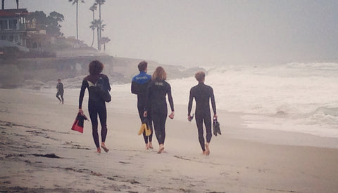 Bodysurfers on the beach