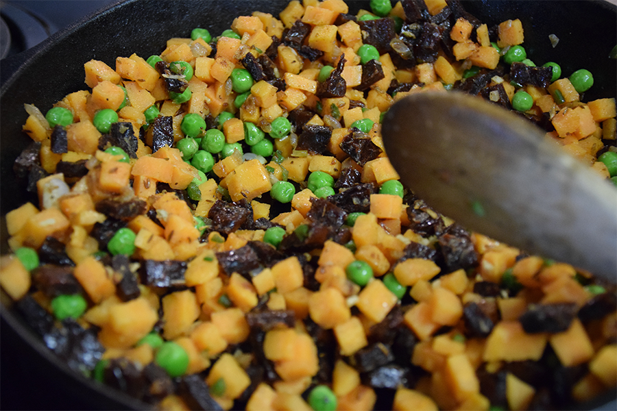 Colorful filling with sweet potatoes, scallions, peas, and EPIC chicken bits