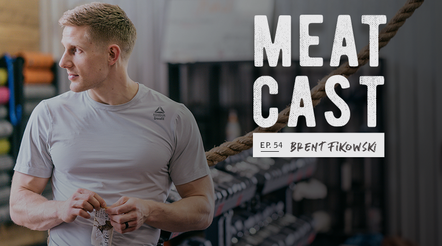 Strong man eating EPIC Bar in gym with text "meatcast ep. 54 – Brent Fikowski" 