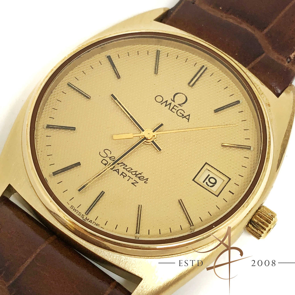 omega seamaster quartz vintage gold