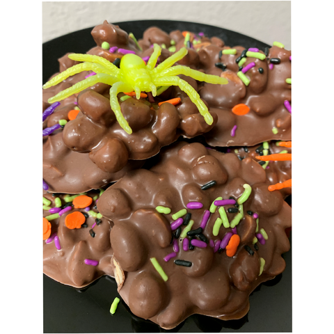 Peanut Chocolate Clusters posed with fake spider