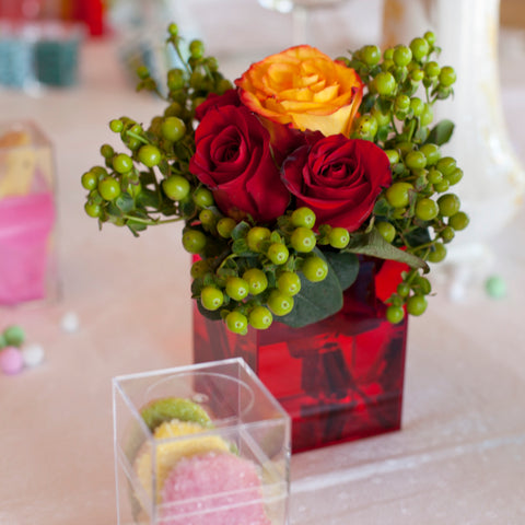Ember 105C box with yellow roses flower arrangement on a tabletop