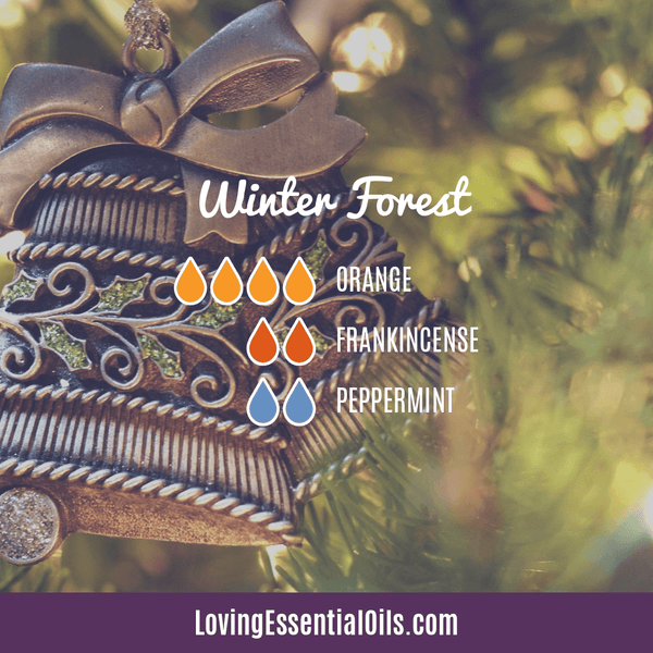 Essential oil diffuser recipes for winter by Loving Essential Oils - Winter forest with orange, frankincense and peppermint