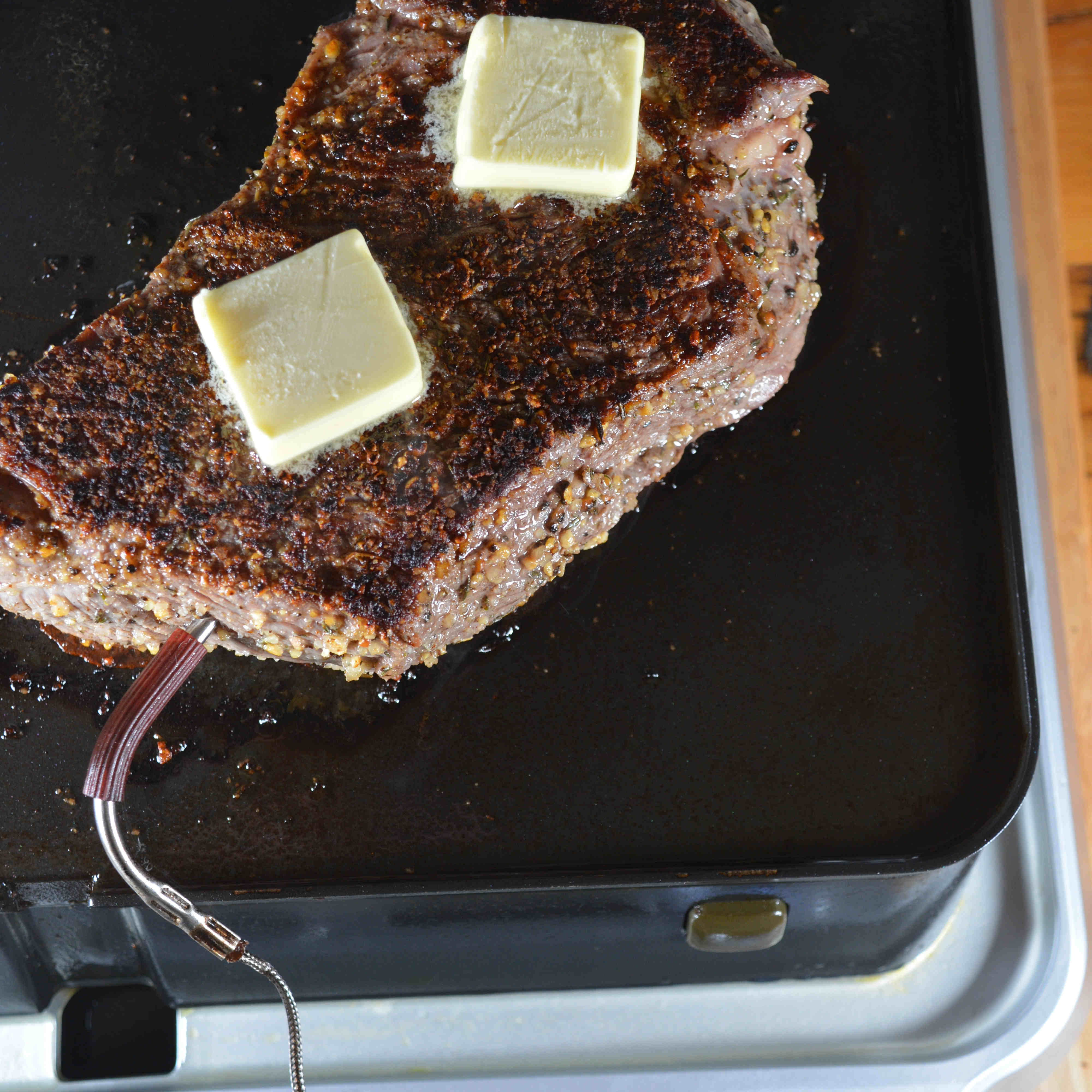 Grass-fed beef shoulder steak cooked to medium rare on a cinder precision grill 