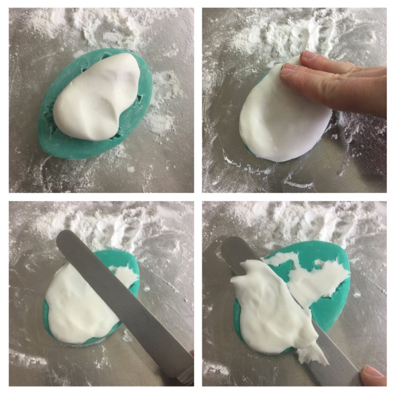 Filling a silicone mould with fondant