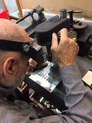 Virgilio Rubini Working on Custom Rowing Necklaces After Engraving Them, Made for University of Washington Rowing
