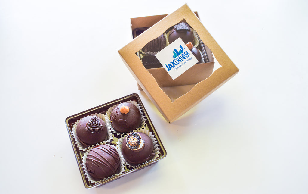 Truffles with box with Jax Chamber logo