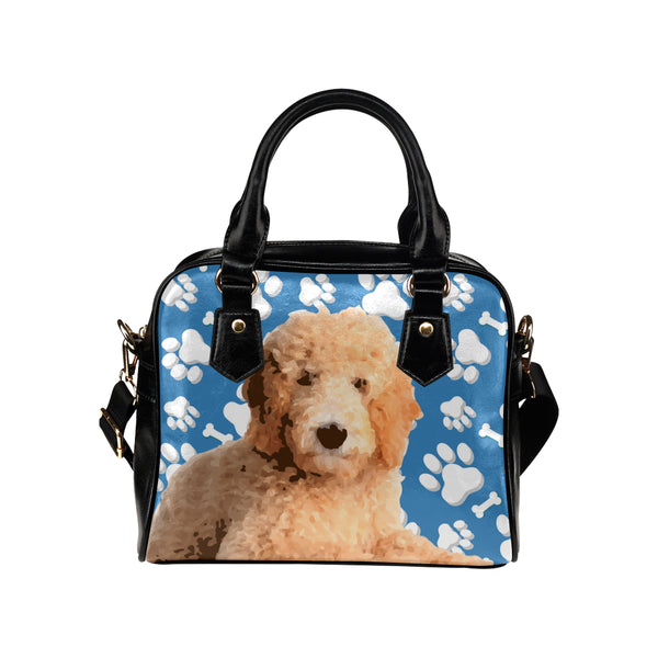 goldendoodle in backpack