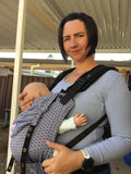 Breastfeeding in a baby carrier