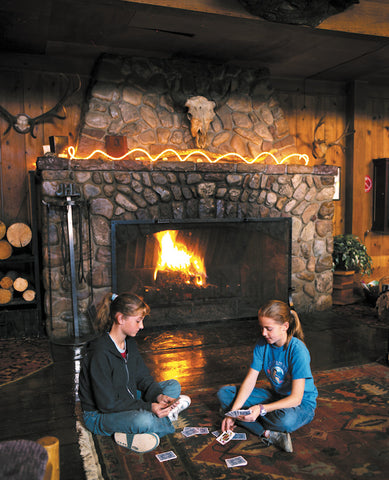 where to find hot springs in Montana, Montana Living, Jackson Hot Springs Montana dining room A family enjoys the big fireplace at Jackson Hot Springs, Montana. Michael Javorka photo