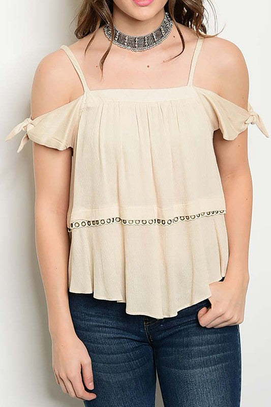 tan colored off the shoulder with strap flowing shirt