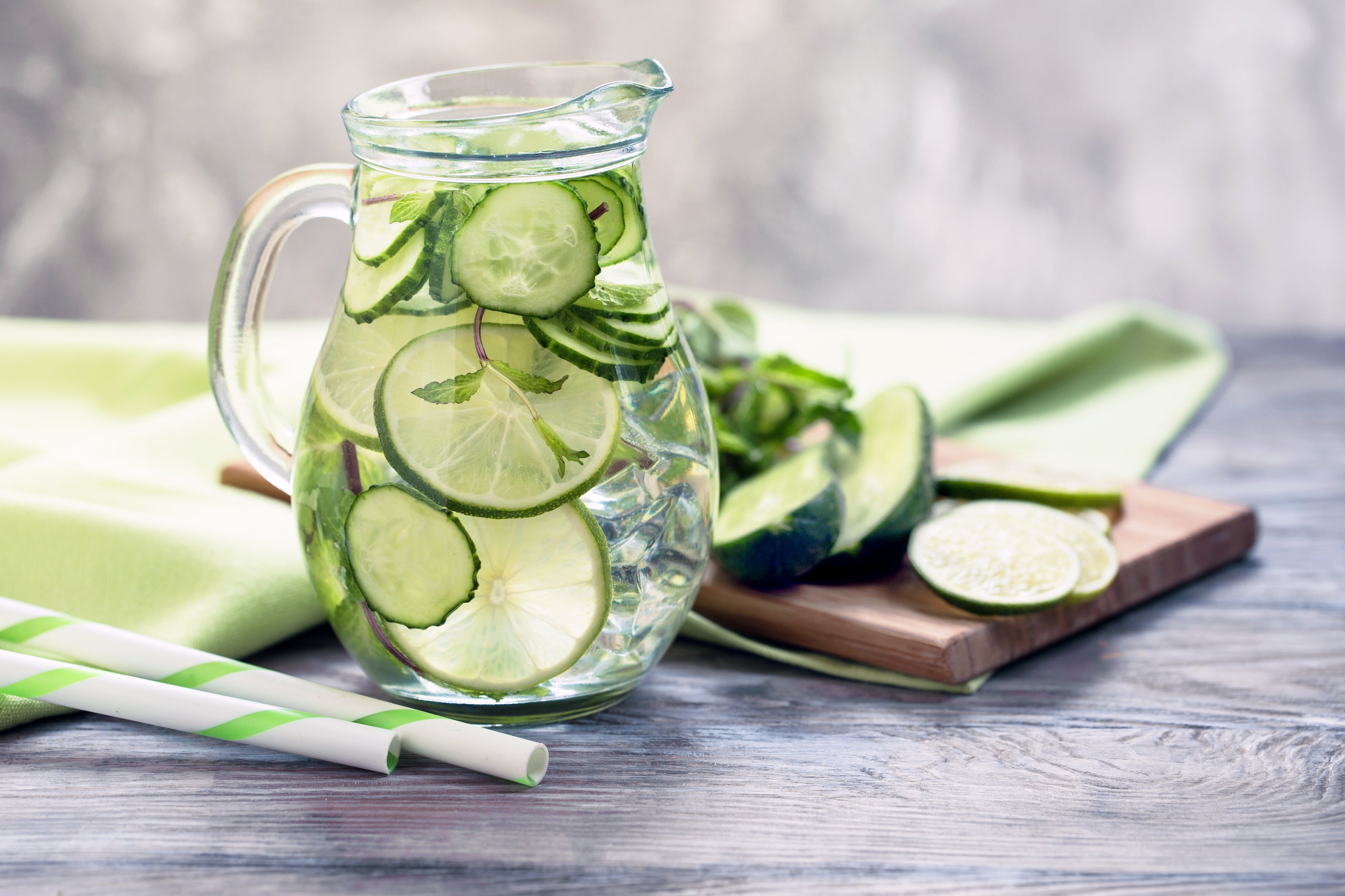 pitcher of water infused with cucumbers