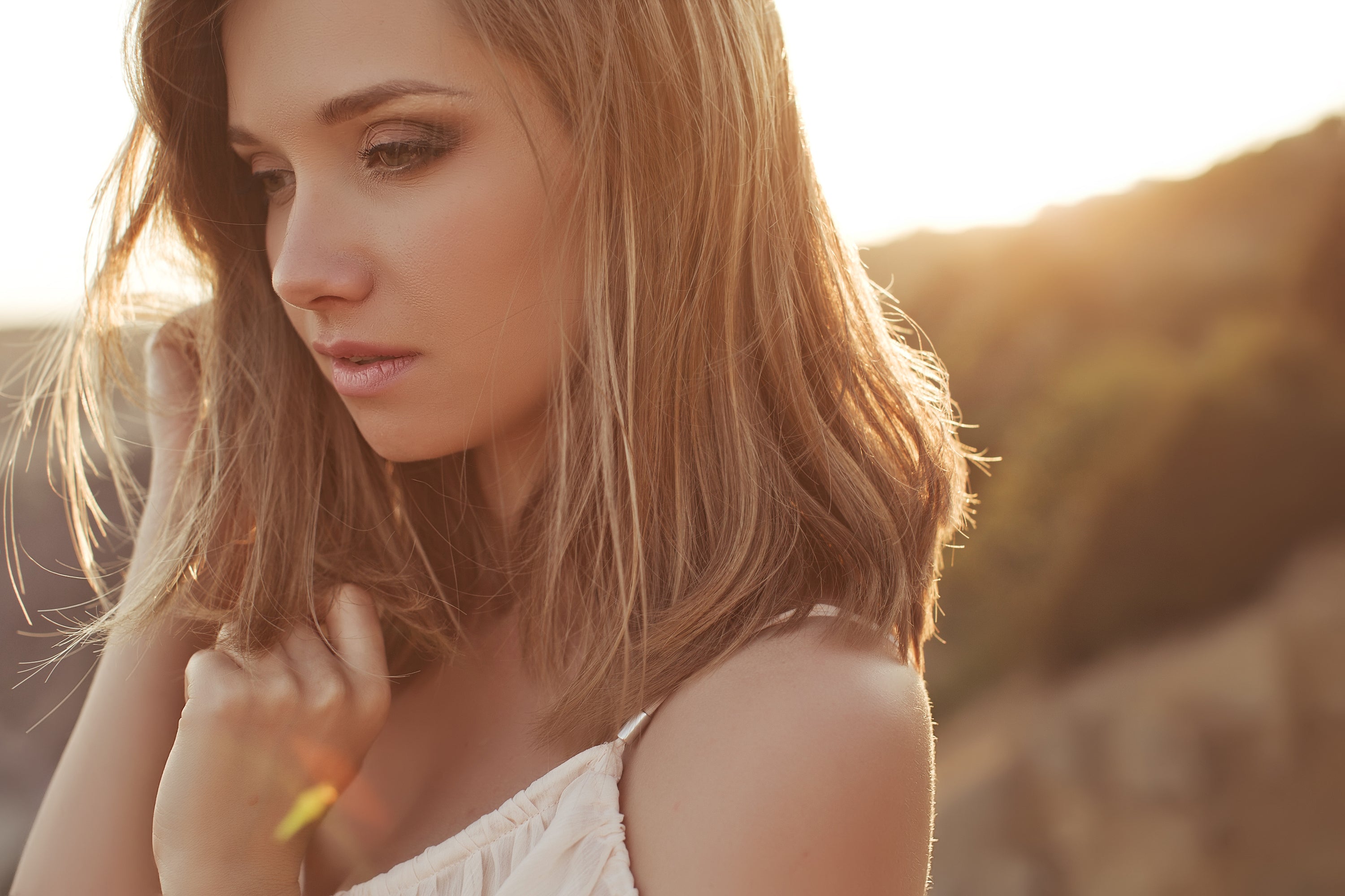 woman with good skin outside in sunlight