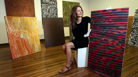 Annabel Holt with paintings from her family's private collection of work by Emily Kame Kngwarreye. The paintings go on the block on March 27. Picture: David Geraghty Source: The Australian