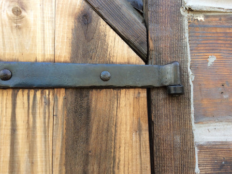 Custom straps and hinges are made to order for your specific needs and tastes. Hardware can be forged to look aged or in more contemporary designs.