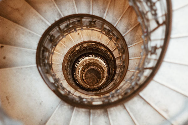 sergiu valena spiral staircase Budapest via unsplash