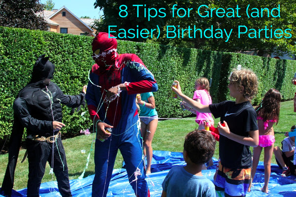 A tarp, silly string and two kids dressed as superheroes is all you need for a birthday party to remember