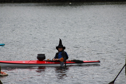 a kayaking witch on the Mystic River