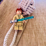 a couple adds skywalker lego to wedding boutonniere