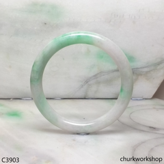 Pale lavender base with green bangle