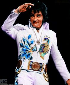 Elvis Blue Nail Jumpsuit Elvis on Tour cross necklace