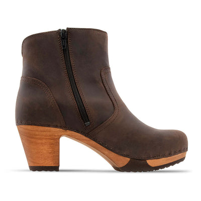 clogs damen tanja woody holzschuhe. tanya ankle boots gefüttert, damenstiefel, stiefel, damenclogs mit flexibler, biegsamer holzsohle. holzclogs, clogs damen knöchel stiefel, damen clogs mit fussbett. ankleboots holz schuhe, holzclog, holzschuhe kaufen.