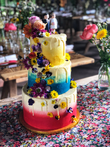 Bright Ombre Tiered Cake Wedding Cake with Edible Flowers