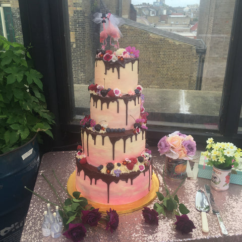 Pink Ombre Tiered Cake Wedding Cake with Edible Flowers