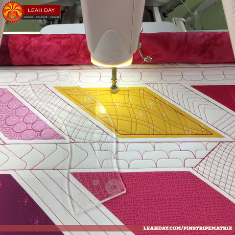 Loading a quilt on a longarm quilting frame