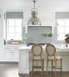 minidal sharp Kitchen with french chairs