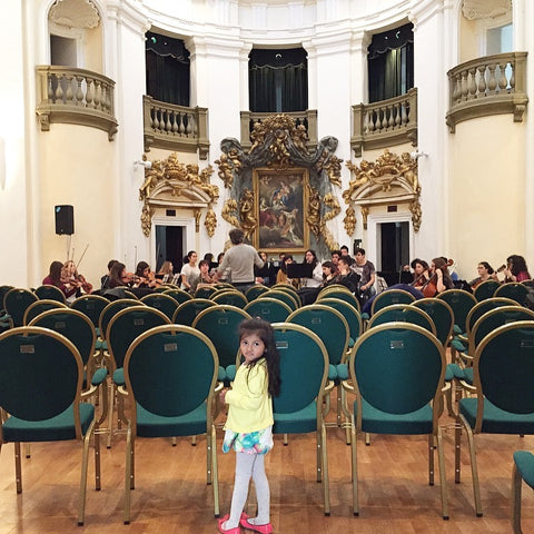 music hall with children. philharmonic italy. perugia umbria countryside