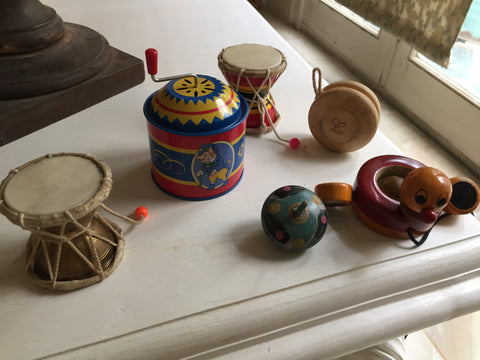Small acoustic vintage toys like music box, indian drums damroo