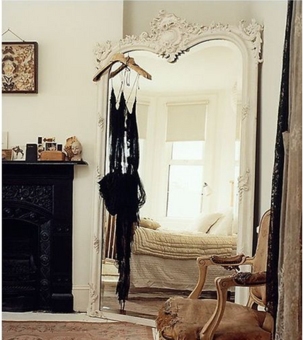Bohemian chic, oversized mirror. Interior decor