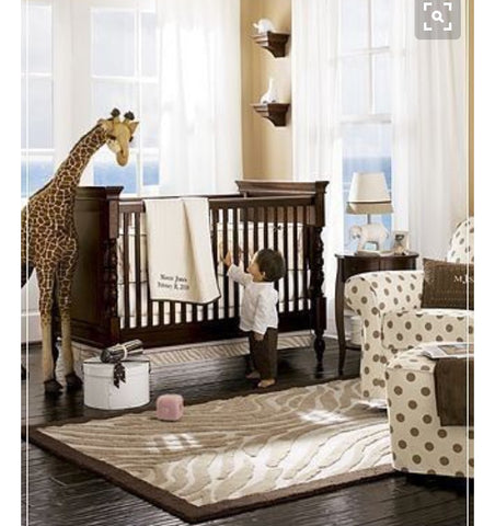 brilliant nursery decor inspirations. giraffe toy, cot. white room. gender neutral.