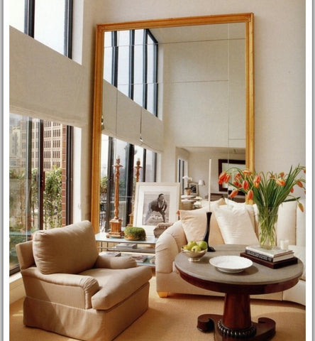 Classic mirror with modern cozy decor. 