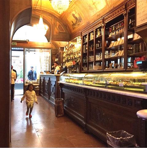 Beautiful pastry shop with classic decor and renaissance frescos