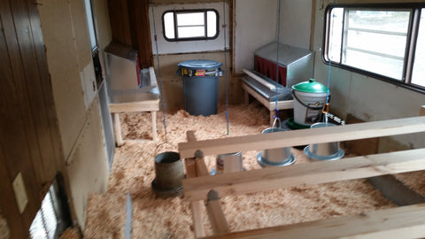 Mobile chicken coop with rollout nest boxes
