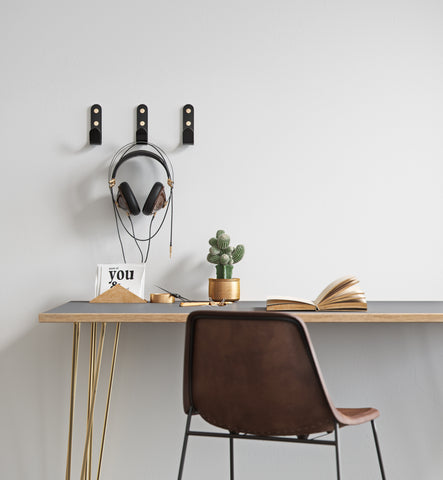 Black wall hooks with brass caps