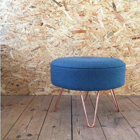 Upholstered footstool with hairpin legs