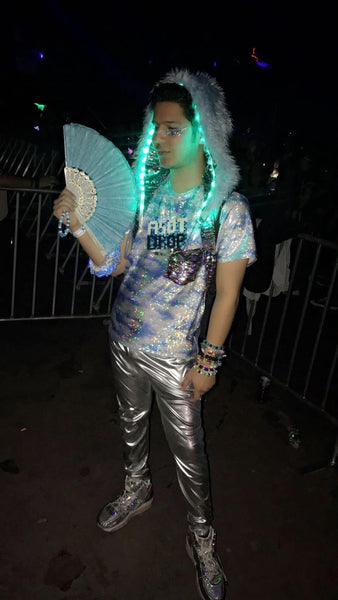 raver in iridescent LED festival outfit 