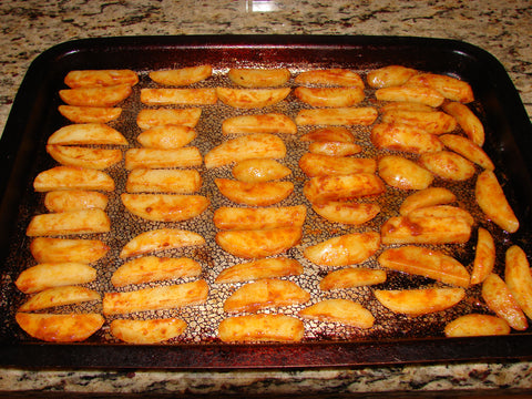 photo of the steamed fries on a baking sheet