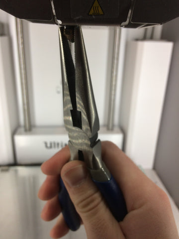 Using pliers on Ultimaker 2+ 3D printer nozzle