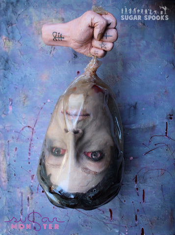 Clearly creepy.<br>Head in a Flexique Bag, featured in Inked Magazine.